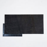49-9022.SLC.2.jpg Hermann Oak Drum Dyed Black Pre-Cut 6-7 oz. 12" x 24" Image