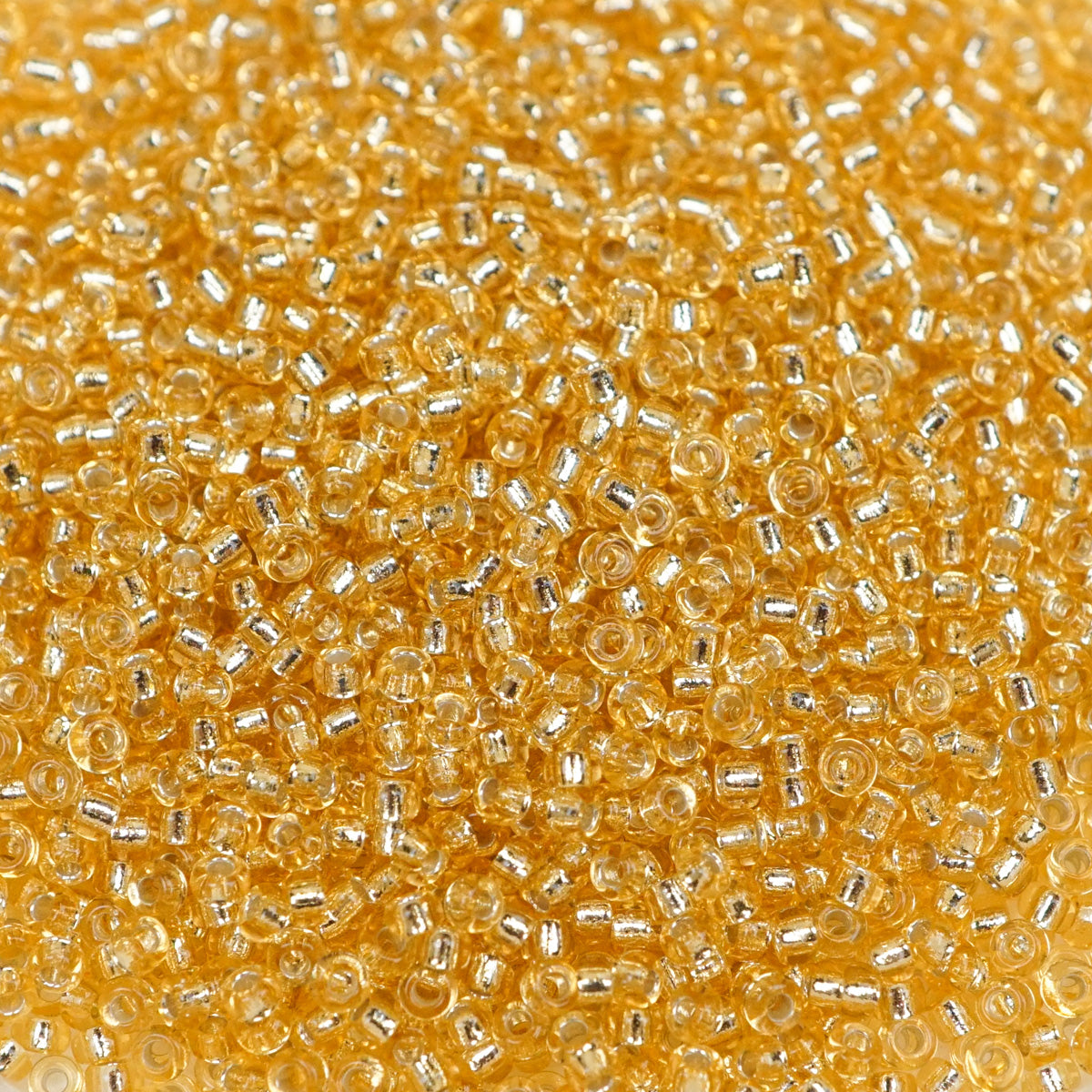 45-1593.SLC.1.jpg 15/0 Seed Beads - Silver Lined Gold 8.2g Image