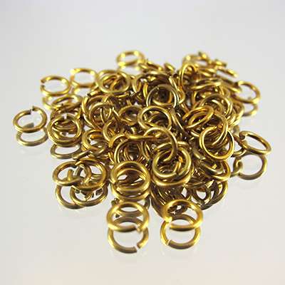 144-1010.SLC.jpg 50pk Mix Bag Gold Jump Rings Image