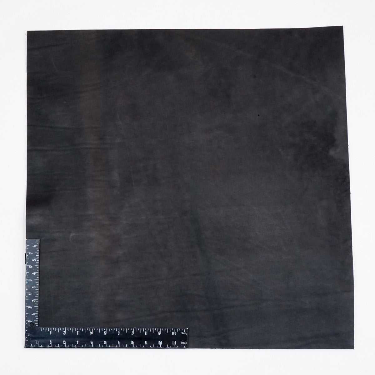 49-9124.SLC.2.jpg Hermann Oak Drum Dyed Black Pre-Cut 8-10 oz. 24" x 24" Image
