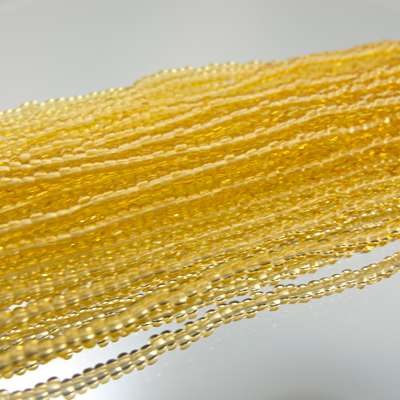 26-110153.SLC.jpg 11/0 Seed Beads - Transparent Amber 20g Image