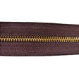 129-135302.SLC.jpg YKK #5 Zipper Tape - Brown/Brass Yard Image